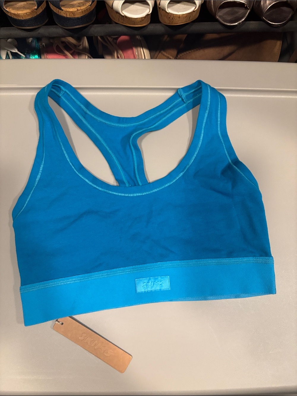 SKIMS Vibrant Teal Racerback Sports Bra